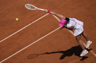 Poland's Iga Swiatek serves the ball to Germany's Angelique Kerber at the Italian Open tennis tournament in Rome, Monday, May 13, 2024. (AP Photo/Alessandra Tarantino)