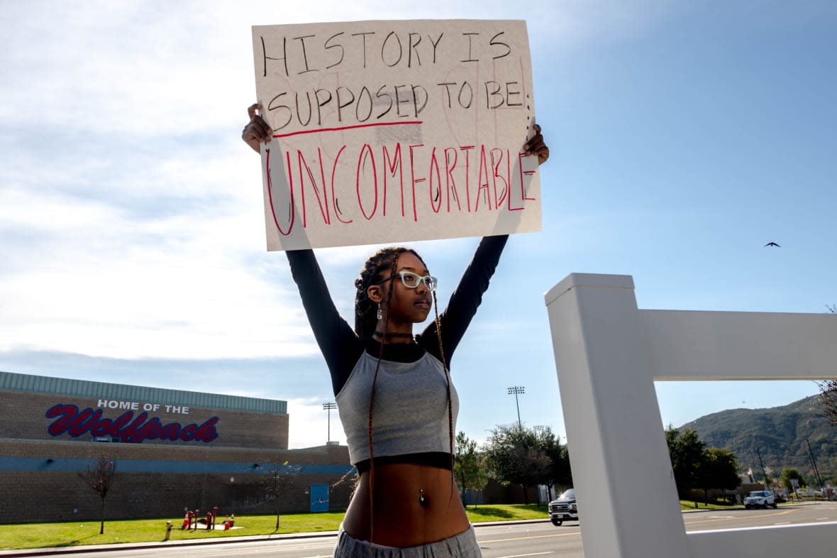 Student Samaya Robinson, 17, holds a sign in protest of the district’s ban on critical race theory curriculum at Great Oak High School in Temecula on Friday, Dec. 16, 2022. (Photo by Watchara Phomicinda/The Press-Enterprise via Getty Images)