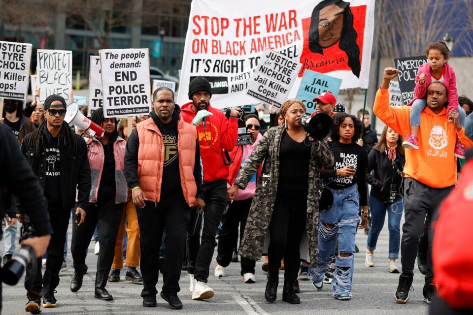 Demonstrators march during a protest on Saturday in Atlanta over the death of Tyre Nichols (AP)