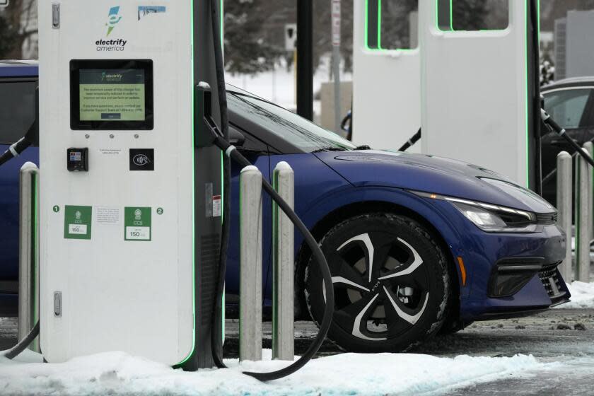 FILE - A Electrify America Charging Station for electric vehicles is seen at Westfield Old Orchard shopping center in Skokie, Ill., Jan. 29, 2023. The Biden administration will propose new automobile pollution limits this week that would require at least 54% of new vehicles sold in the U.S. to be electric by 2030, ramping up quickly to as high as 67% by 2032. That's according to three people briefed on the plan. (AP Photo/Nam Y. Huh, File)