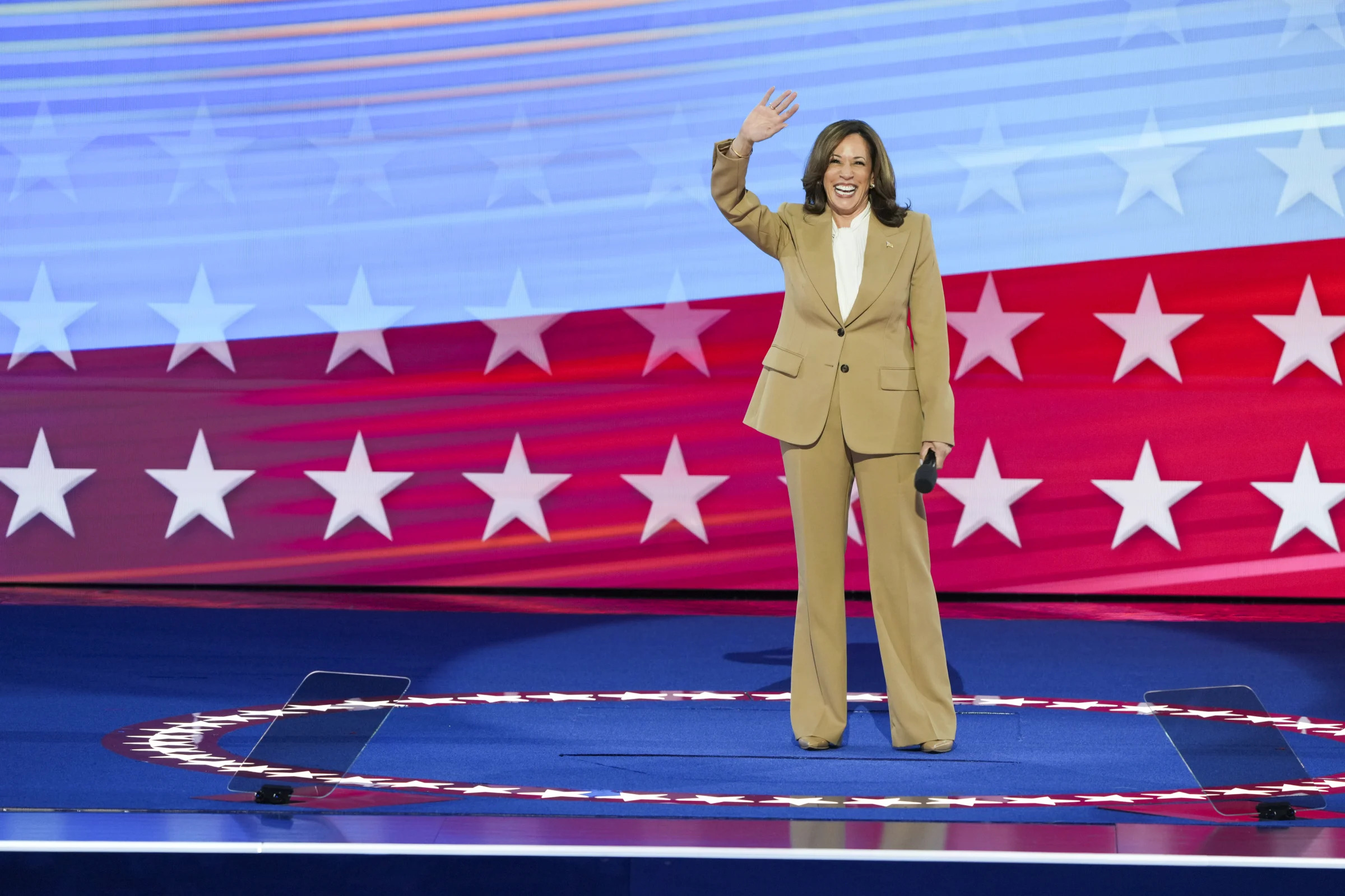 In her choice of a tan suit, many observers concluded that Kamala Harris was subtly poking fun at past conservative horror over Barack Obama wearing one during his presidency. (Ruth Fremson/The New York Times)