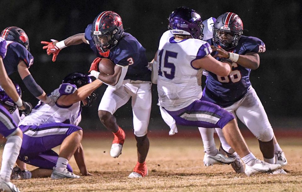Belton Honea Path Marquise Henderson (3) runs by Walhalla senior Bryce Payne (15) being blocked by teammate Belton Honea Path Keylan Dixon (66) during the third quarter of the Class AAA State Playoffs at Belton-Honea Path High in Honea Path, S.C. Friday, November 4, 2022.