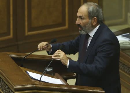 Armenian opposition leader Nikol Pashinyan addresses lawmakers during a parliament session to elect an interim prime minister in Yerevan, Armenia May 1, 2018. REUTERS/Vahram Baghdasaryan/Photolure