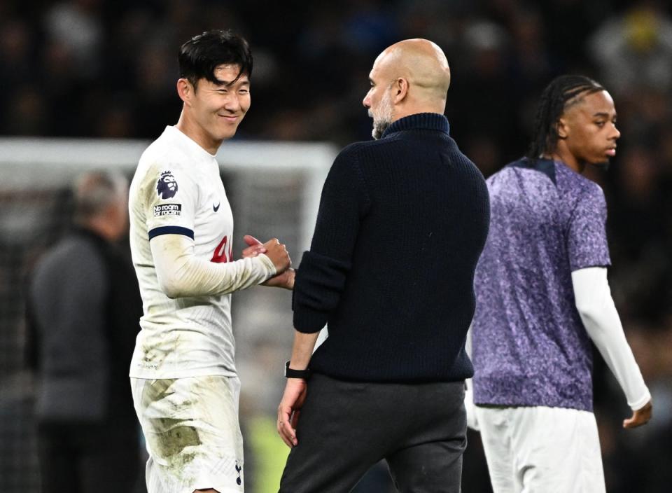 Son shares a handshake with Pep Guardiola at full-time (Reuters)