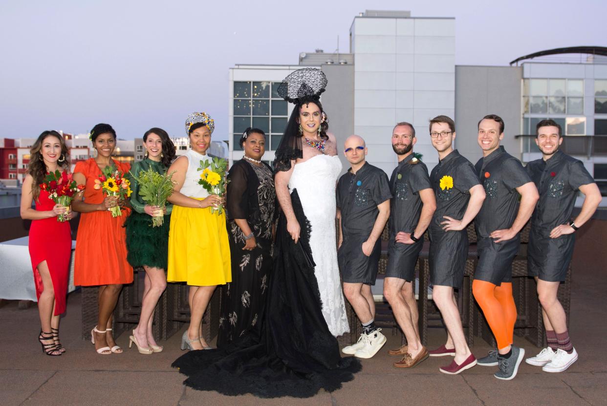 James Hilton Harrell (center) appearing as their drag alter ego, Diane A. Lone, at the wedding along with the full bridal party. (Photo: <a href="http://www.elyssamaxxgoodman.com/" target="_blank">Elyssa Goodman</a>)