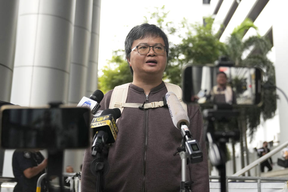 Arnon Nampa talks to reporter on the arrival at the Criminal court before hearing his first verdict in his trial on a royal defamation charge Tuesday, Sept. 26, 2023. The prominent Thai human rights lawyer was convicted on Tuesday of insulting the monarchy and sentenced to four years in prison, the first conviction under a controversial law guarding the royal institution since a civilian government took office after years of military-backed rule. (AP Photo/Sakchai Lalit)