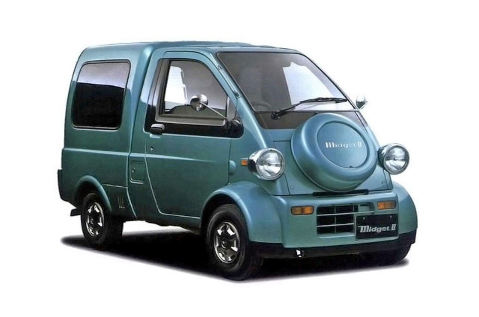 <p>Originally released in 1957, the Midget was a<em> kei </em>truck that followed the famous rickshaw platform – three wheels, doorless and one front seat. In 1996, a second generation arrived with four wheels, a fully-enclosed cabin, available with one or two seats, and a<strong> 660cc </strong>engine to meet kei car regulations. </p><p>Its oddball looks quickly put it at the top of many ‘ugly car’ lists and many will most likely question its reason to exist but if you squint your eyes a bit more, it’s somewhat adorable and it’s a reminder of just how special the kei cars of Japan are.</p>