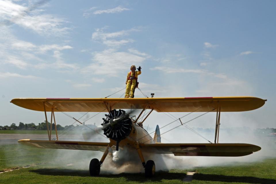 The Northern Echo: Nancy Spencer pictured strapped to a biplane for a fundraising wing walk.