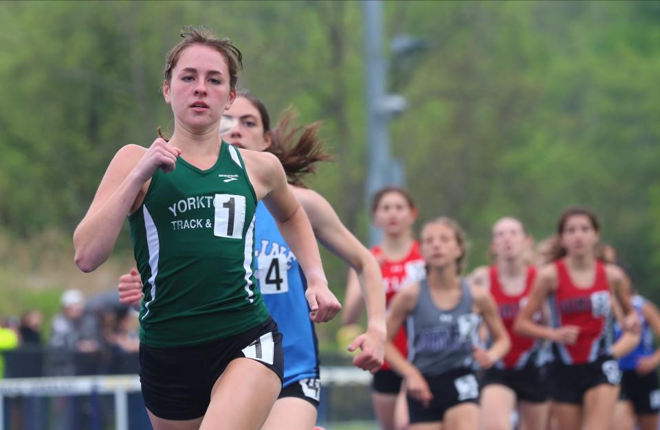 Yorktown's Sydney Leitner leads the 3000-meter run during day 1 of the Westchester County track & field championships at Horace Greeley High School in Chappaqua on Friday, May 20, 2022.