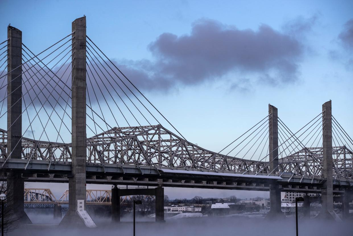 Steam rose from the Ohio River in Louisville with the Lewis & Clark and Kennedy Bridges in the background. Jan 7, 2022.