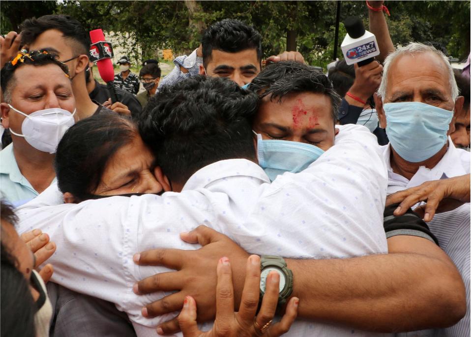 CRPF commando Rakeshwar Singh Manhas, who was released by naxals after being captured during an encounter in Chhattisgarh, being welcomed by his family on his arrival in Jammu on Friday, 16 April.