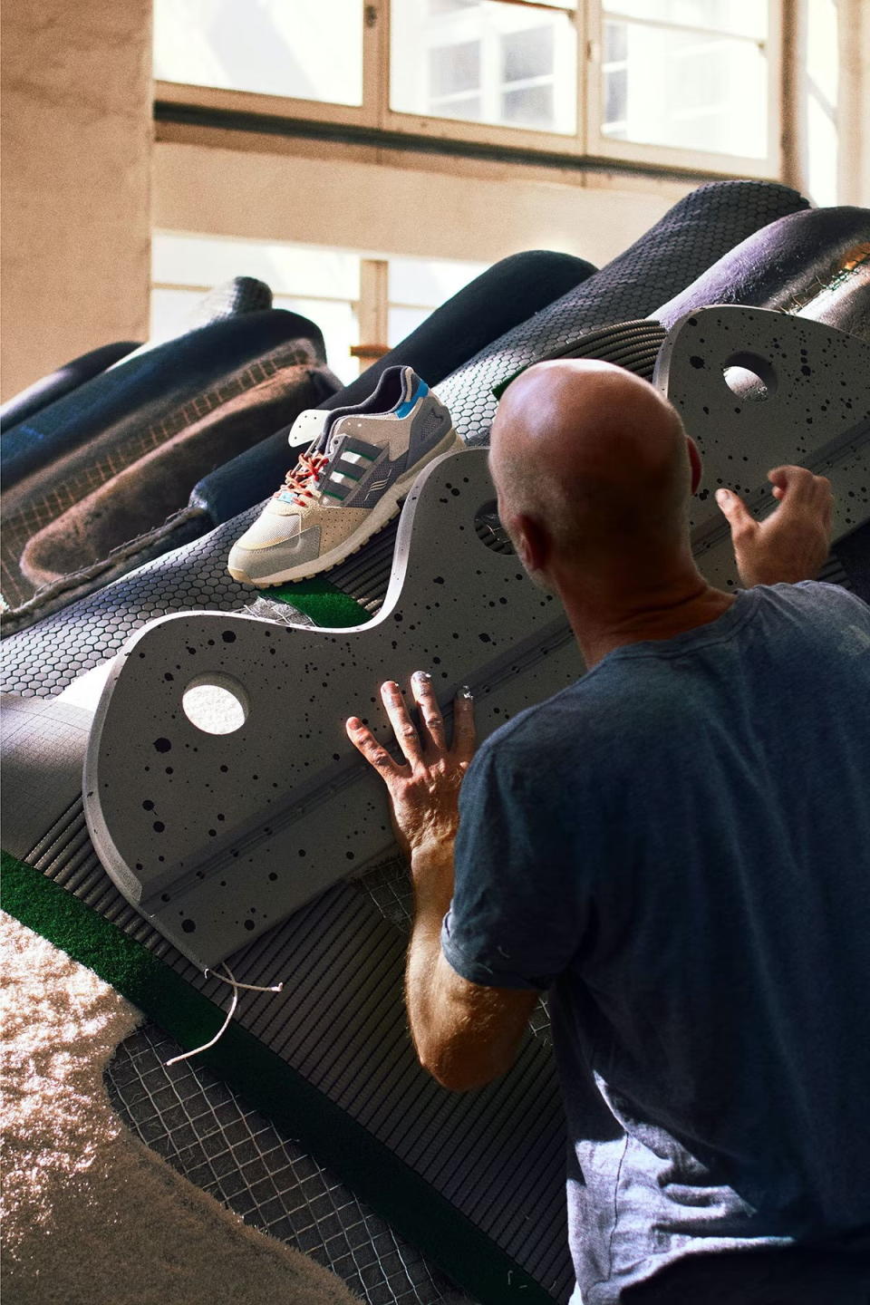 Craftsman works to match the giant Hornbach Sneaker Pool with a real Adidas ZX 10000.