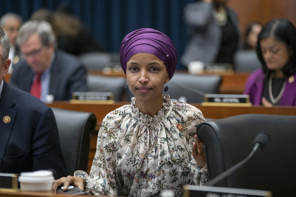 Rep. Ilhan Omar, D-Minn., sits with fellow Democrats on the House Education and Labor Committee during a bill markup, on Capitol Hill in Washington, Wednesday, March 6, 2019. Omar stirred controversy last week saying that Israel's supporters are pushing U.S. lawmakers to take a pledge of "allegiance to a foreign country." Omar is not apologizing for that remark, and progressives are supporting her. (AP Photo/J. Scott Applewhite)