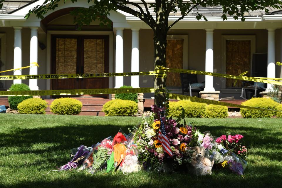 Flowers, photos and stuffed animals are placed on the front lawn of a home where Riley Boyle, 17, died in a fire at her home on Bonnie Way in Allendale. The fire occurred on June 4, 2022 in the late afternoon.