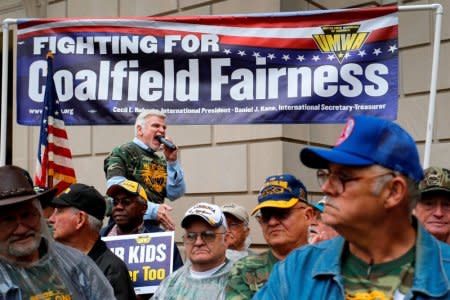 FILE PHOTO: United Mine Workers of America International President Cecil Roberts (top) leads his members in a rally outside the U.S. Environmental Protection Agency headquarters in Washington, DC, U.S., October 7, 2014.   REUTERS/Jonathan Ernst/File Photo