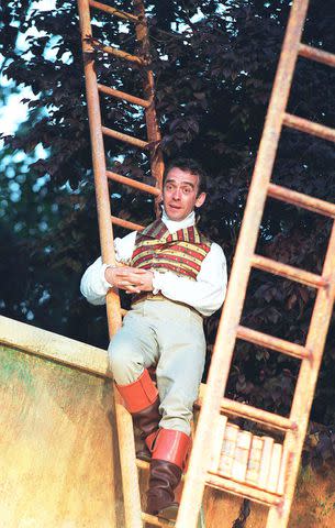 <p>Alastair Muir/Shutterstock</p> Adrian Schiller performing at the Open Air Theatre, Regent's Park on June 4, 2001