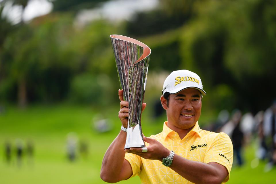 Hideki Matsuyama, of Japan, holds the the Genesis Invitational trophy after he won the final round of the Genesis Invitational golf tournament at Riviera Country Club, Sunday, Feb. 18, 2024, in the Pacific Palisades area of, Los Angeles. (AP Photo/Ryan Sun)