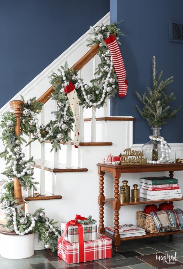 <p>Treat your staircase as the main attraction by placing ornaments, garland, stockings, and even presents on and around it for decoration.</p><p><strong>See more at <a href="https://inspiredbycharm.com/how-i-plan-my-christmas-home-decor/" rel="nofollow noopener" target="_blank" data-ylk="slk:Inspired by Charm;elm:context_link;itc:0;sec:content-canvas" class="link ">Inspired by Charm</a>.</strong></p><p><a class="link " href="https://www.amazon.com/Free-Yoka-Christmas-Stockings-Decorations/dp/B07GWLX8DY/?tag=syn-yahoo-20&ascsubtag=%5Bartid%7C10050.g.23362967%5Bsrc%7Cyahoo-us" rel="nofollow noopener" target="_blank" data-ylk="slk:SHOP STOCKINGS;elm:context_link;itc:0;sec:content-canvas">SHOP STOCKINGS</a></p>