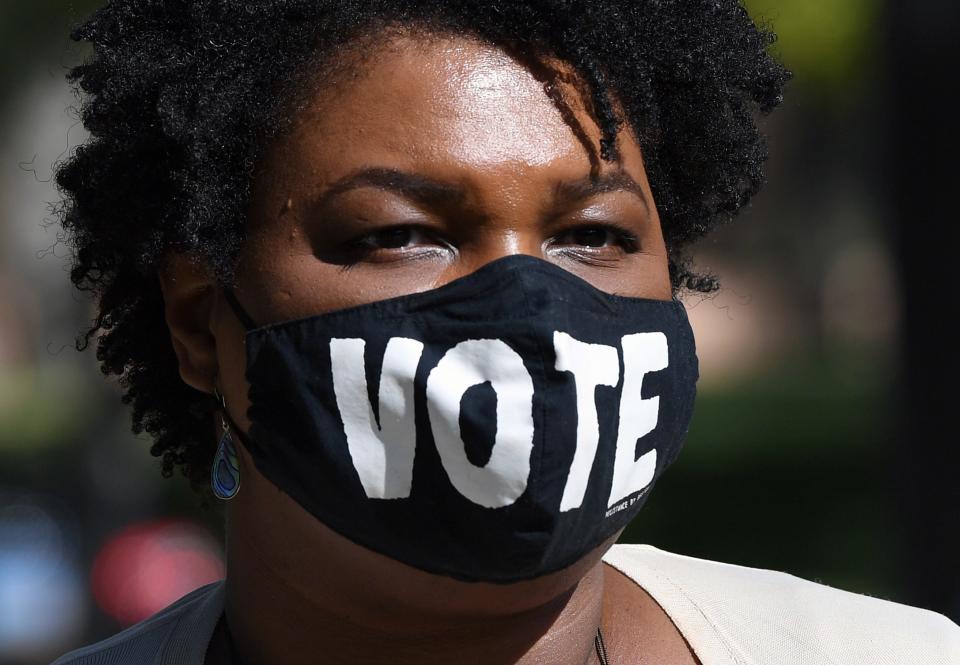 LAS VEGAS, NEVADA - OCTOBER 24:  Former Georgia gubernatorial candidate Stacey Abrams waits to speak at a Democratic canvass kickoff as she campaigns for Joe Biden and Kamala Harris at Bruce Trent Park on October 24, 2020 in Las Vegas, Nevada. In-person early voting for the general election in the battleground state began on October 17 and continues through October 30.  (Photo by Ethan Miller/Getty Images) ORG XMIT: 775581074 ORIG FILE ID: 1282041182