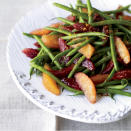 <p>Blood orange makes a unique partner with green beans because it offers raspberry-like hints along with its citrusy taste to the mix. Use the juice from the fruit to combine with honey and balsamic vinegar for a custom dressing to go on top.<b> Get Food & Wine’s <a href="http://www.foodandwine.com/recipes/green-bean-and-blood-orange-salad" rel="nofollow noopener" target="_blank" data-ylk="slk:Green Bean and Blood Orange Salad;elm:context_link;itc:0;sec:content-canvas" class="link ">Green Bean and Blood Orange Salad</a> recipe. </b><i>(Photo: Ditte Isager)</i></p>