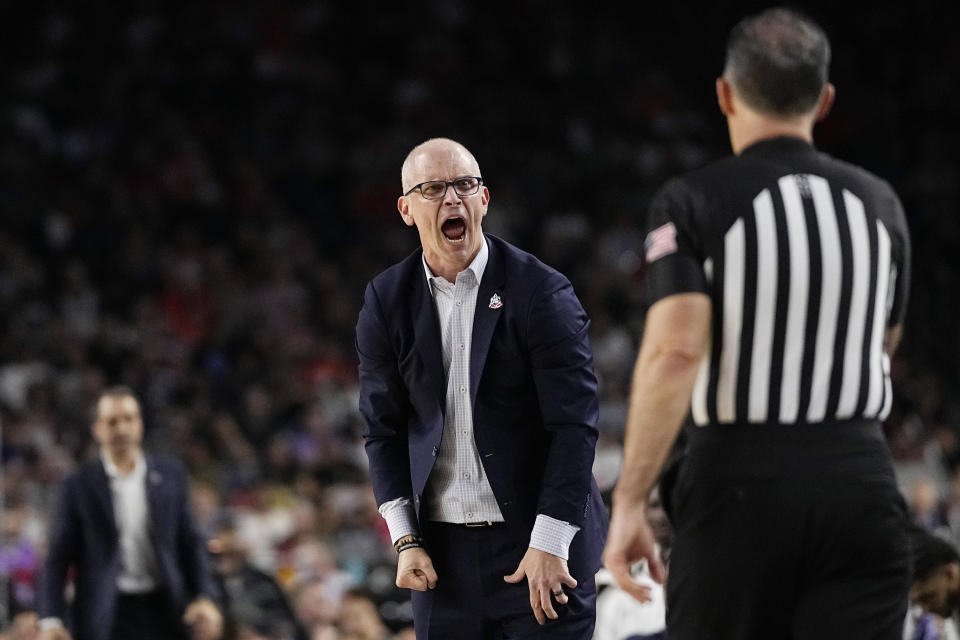 Connecticut head coach Dan Hurley yells at an official during the first half of a Final Four college basketball game against Miami in the NCAA Tournament on Saturday, April 1, 2023, in Houston. (AP Photo/David J. Phillip)
