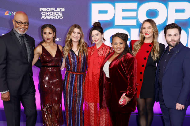 SANTA MONICA, CALIFORNIA - DECEMBER 06: (L-R) James Pickens Jr., Kelly McCreary, Ellen Pompeo, Caterina Scorsone, Chandra Wilson, Camilla Luddington, and Jake Borell attend the 2022 People's Choice Awards at Barker Hangar on December 06, 2022 in Santa Monica, California. (Photo by Frazer Harrison/WireImage)<p><a href="https://www.gettyimages.com/detail/1447269059" rel="nofollow noopener" target="_blank" data-ylk="slk:Frazer Harrison/Getty Images;elm:context_link;itc:0;sec:content-canvas" class="link ">Frazer Harrison/Getty Images</a></p>