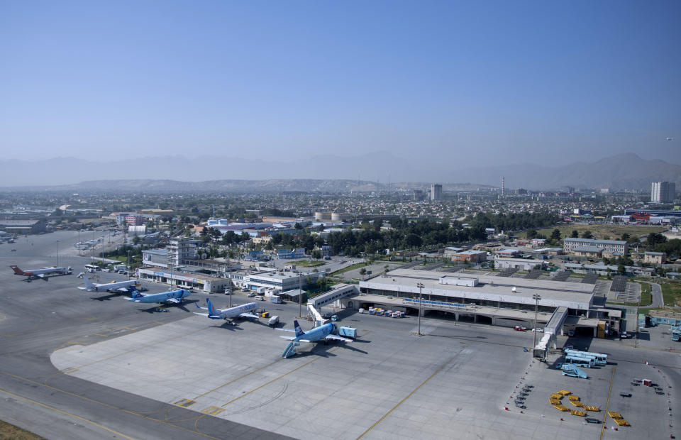 FILE - This July 25, 2015, file photo shows Hamid Karzai International airport in Kabul, Afghanistan. With the U.S. leading the withdrawal from Afghanistan, European allies and Canada want to hear more about President Joe Biden’s thinking. They are concerned about how security will be assured at their embassies, along major transport routes and above all at Kabul’s airport. (AP Photo/Massoud Hossaini, File)