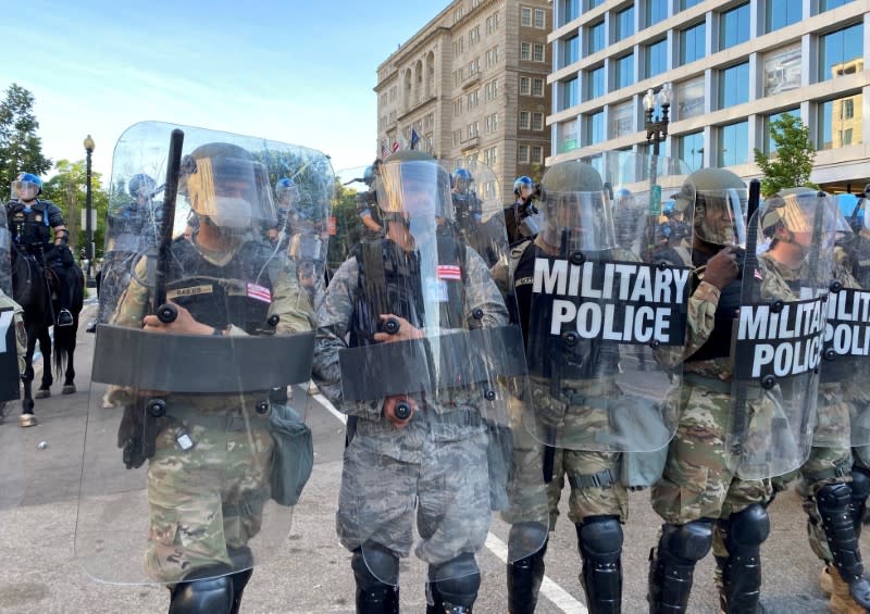 Washington, D.C. national guard military police block street near White House as number of U.S. military forces deployed to streets increases in Washington