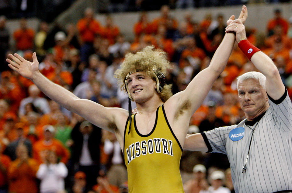 FILE - In this March 18, 2006, file photo, Missouri 174 pound Ben Askren celebrates after beating Northwestern Jake Herbert in the finals of the NCAA Wrestling Championships in Oklahoma City. Askren is finally making his UFC debut after a decade in mixed martial arts and a lifetime of wrestling. (AP Photo/Ty Russell, File)