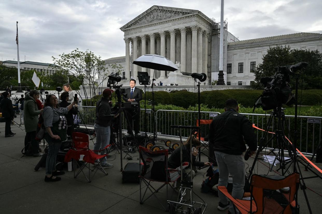There was a lot of press attention paid to the Trump immunity hearing at the Supreme Court building on April 25, 2024. <a href="https://www.gettyimages.com/detail/news-photo/members-of-the-press-work-outside-the-us-supreme-court-on-news-photo/2149550654?adppopup=true" rel="nofollow noopener" target="_blank" data-ylk="slk:Mandel NGAN / AFP/Getty Images;elm:context_link;itc:0;sec:content-canvas" class="link ">Mandel NGAN / AFP/Getty Images</a>