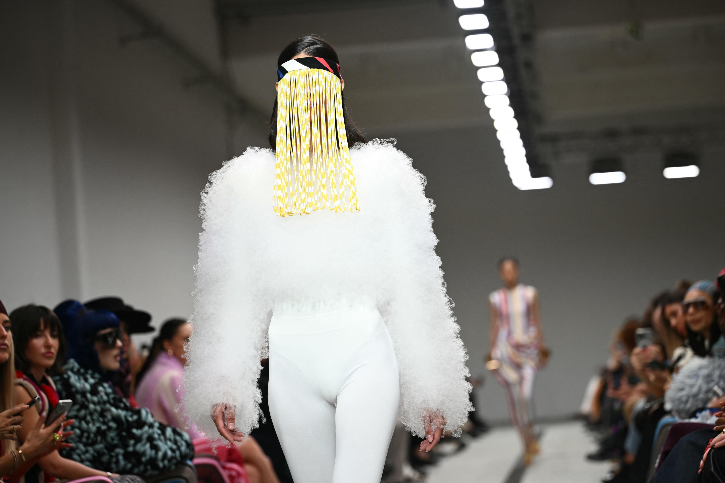 A model walks the runway during the Missoni collection show at Milan's Fashion Week. 