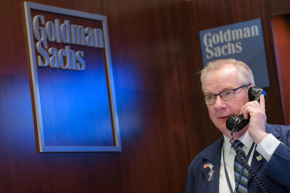 A trader works inside the Goldman Sachs booth on the floor of the New York Stock Exchange (NYSE) in New York, U.S., March 7, 2019. REUTERS/Brendan McDermid