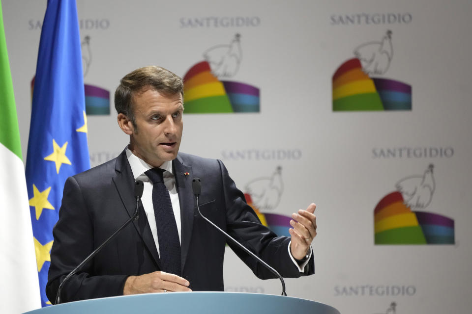 French President Emmanuel Macron delivers his speech at "Cry for peace" an international conference for peace organized by the Community of Sant'Egidio in Rome, Sunday, Oct. 23, 2022. (AP Photo/Alessandra Tarantino)