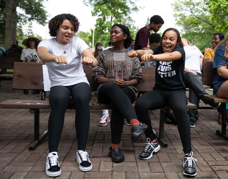 Sierra Jackson, left, and Alanna Walker dance to music during the 2020 Juneteenth Jamboree at Gage Park. The event featured music, food and words of wisdom.