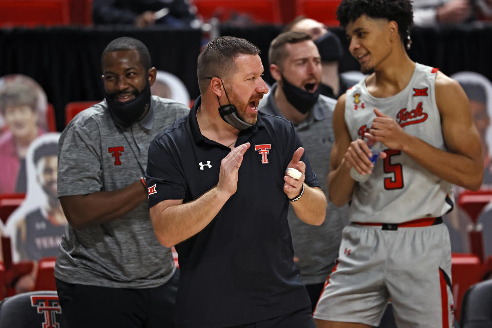 Texas Tech coach Chris Beard claps for the team during the second half of an NCAA college basketball game against Troy, Friday, Dec. 4, 2020, in Lubbock, Texas. (AP Photo/Brad Tollefson)