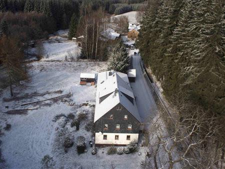 An aerial handout picture provided by Polizeidirektion Dresden shows a house in the town of Hartmannsdorf-Reichenau, some 37 km (22 miles) south of Dresden November 27, 2013. REUTERS/Polizeidirektion Dresden/Handout via Reuters