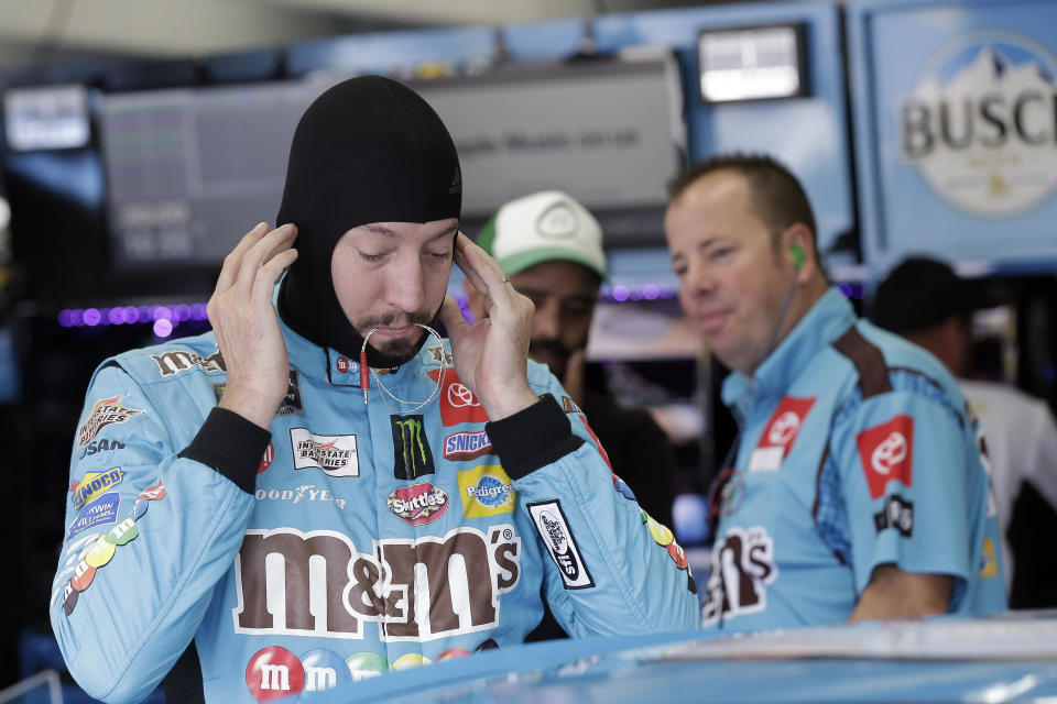 Kyle Busch prepares to practice for Sunday's NASCAR Cup Series auto race at Charlotte Motor Speedway in Concord, N.C., Saturday, Sept. 28, 2019. (AP Photo/Gerry Broome)