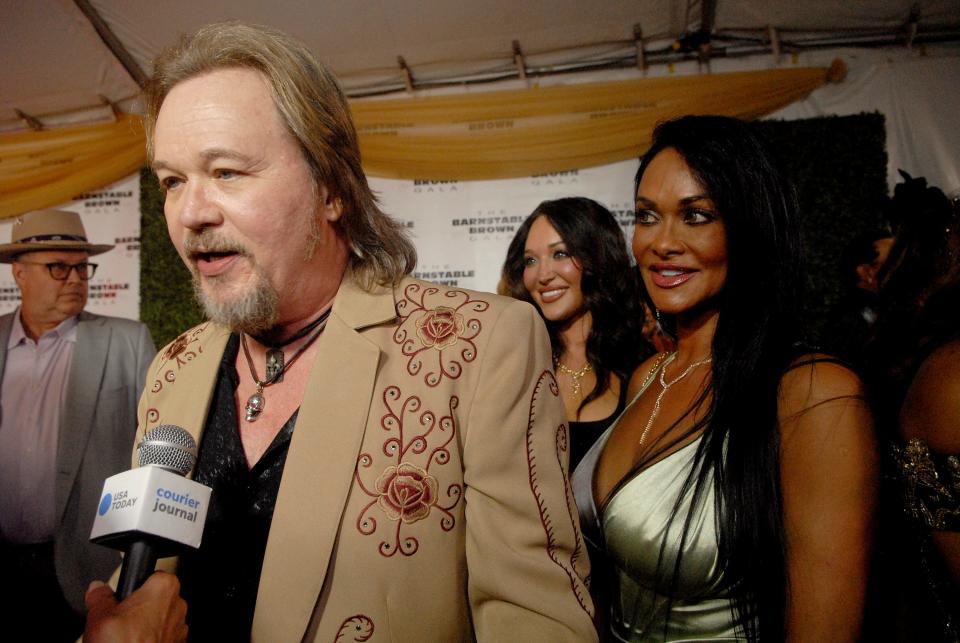 Country singer Travis Tritt talks to reporters on the red carpet at the 35th annual Barnstable Brown Gala on Friday night. May 03, 2024