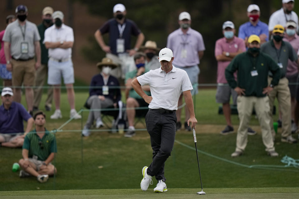 Rory McIlroy, of Northern Ireland waits to putt on the 18th green during the second round of the Masters golf tournament on Friday, April 9, 2021, in Augusta, Ga. (AP Photo/Matt Slocum)