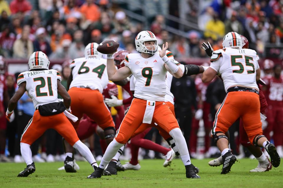 Miami quarterback Tyler Van Dyke throws the ball during the first half of an NCAA college football game against Temple, Saturday, Sept. 23, 2023, in Philadelphia. (AP Photo/Derik Hamilton)