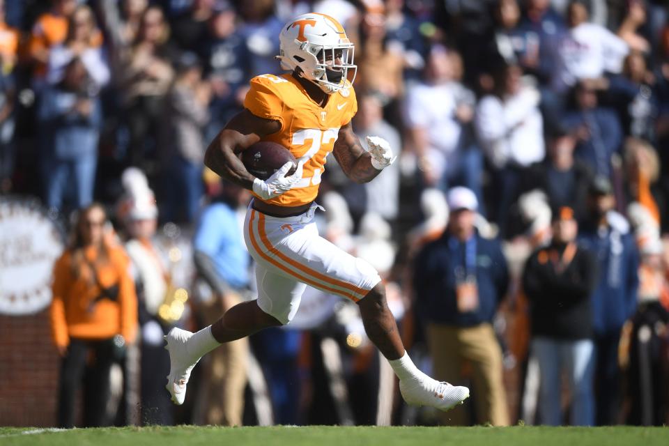 Tennessee running back Cameron Seldon (23) returns a kickoff during the NCAA college football game between Connecticut and Tennessee on Saturday, November 4, 2023 in Knoxville, Tennessee.