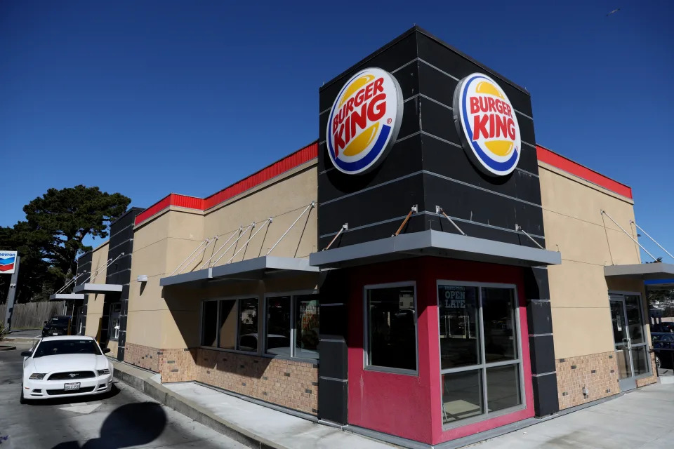 DALY CITY, CALIFORNIA - FEBRUARY 15: A car goes through the drive-thru at a Burger King restaurant on February 15, 2022 in Daly City, California. Restaurant Brands International, the parent company of Burger King, reported strong fourth quarter earnings that beat analyst expectations with revenue of $1.55 billion. (Photo by Justin Sullivan/Getty Images)