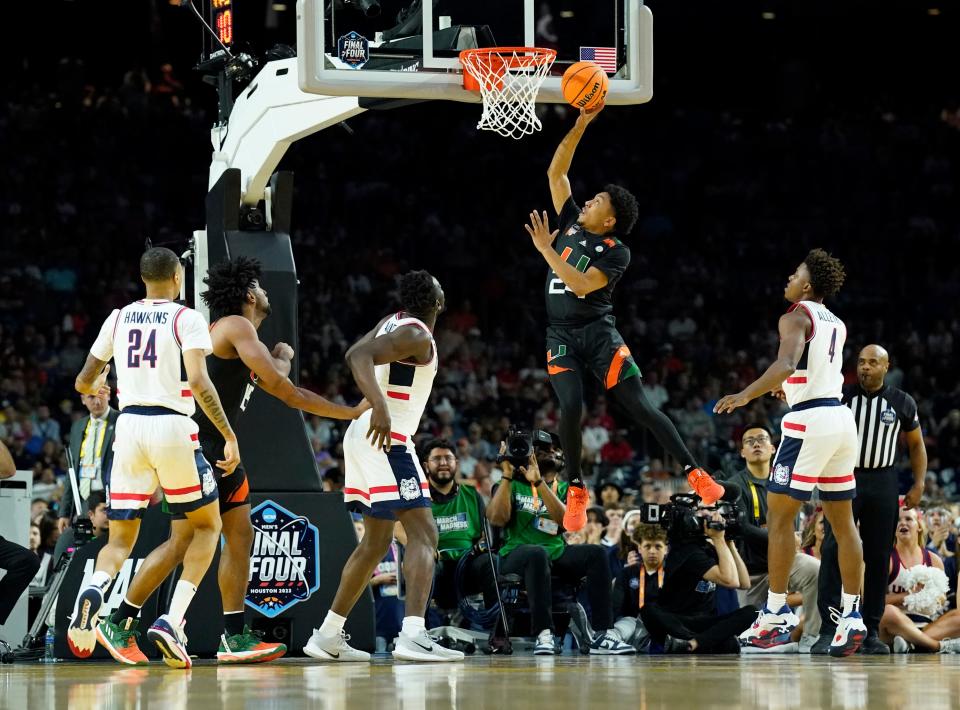 Apr 1, 2023; Houston, TX, USA; Miami Hurricanes guard Nijel Pack (24) shoots against the Connecticut Huskies in the semifinals of the Final Four of the 2023 NCAA Tournament at NRG Stadium. Mandatory Credit: Robert Deutsch-USA TODAY Sports