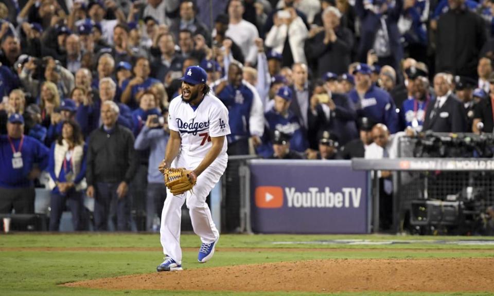 Dodgers’ relief pitcher Kenley Jansen celebrates the final out of Game 6