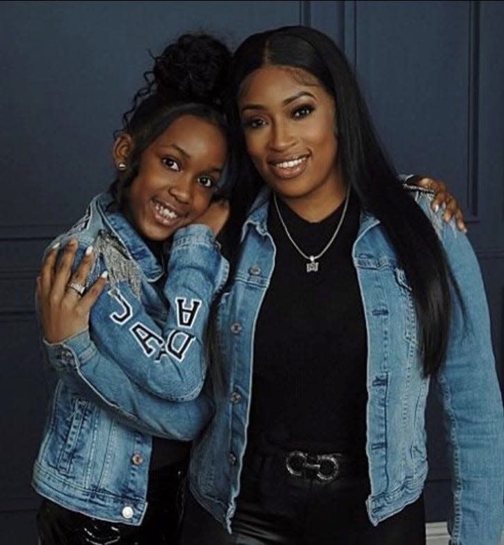 Jayda Smith and her mother, OA'Lisa Mason, of Detroit, seen here Feb. 26, 2022, are celebrating news that Mason has achieved permanent employee status at the Dearborn Truck Plant, where she builds the Ford F-150.