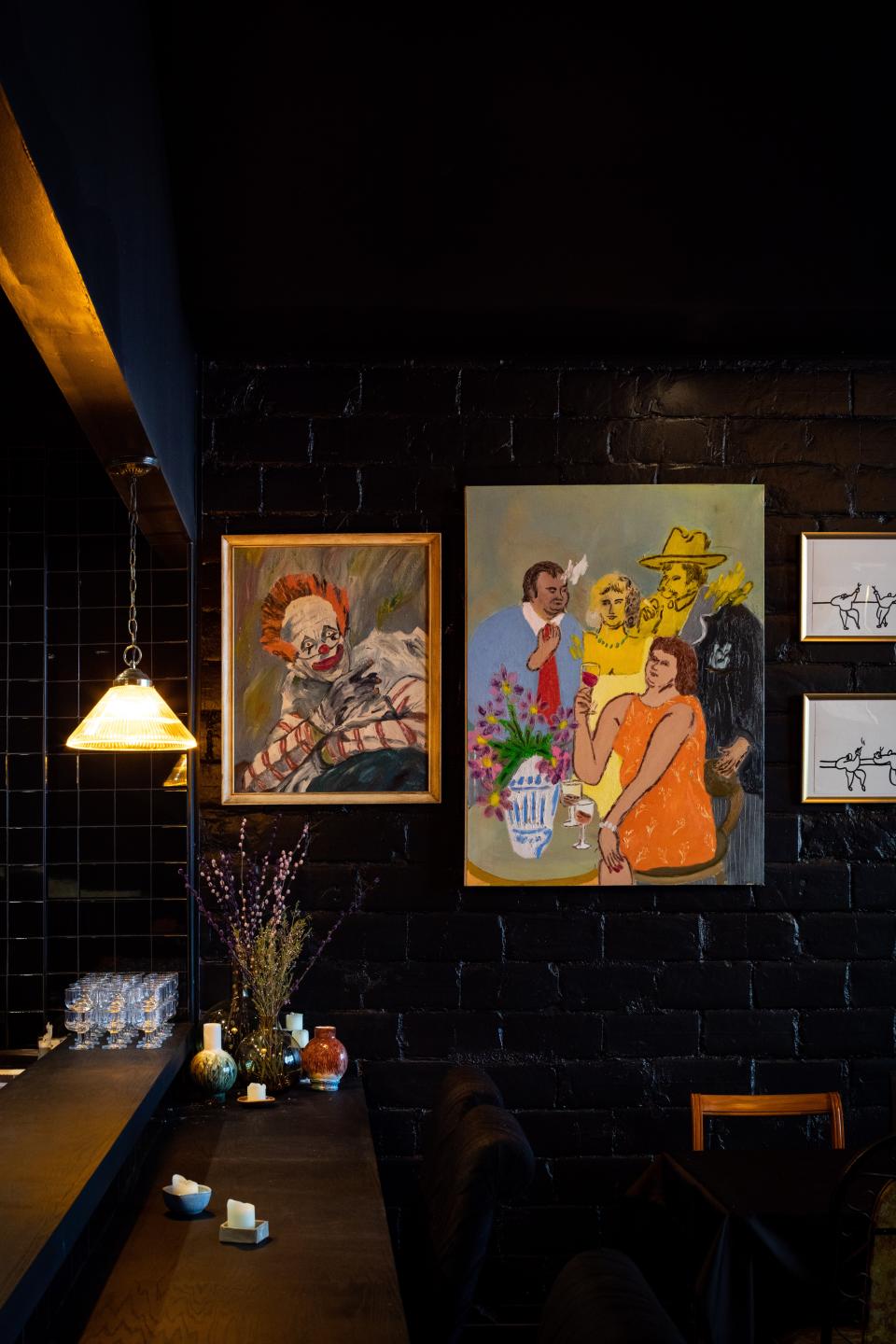 Anand Sheth, an interior designer based in San Francisco, adorned a wine bar he designed in Oakland. “People love the stories behind them, even if they’re not related to the folks in the pictures,” he says. “It’s like bringing a piece of history into the present without being overly nostalgic.” The large painting on the right is by Gabe Kasor.