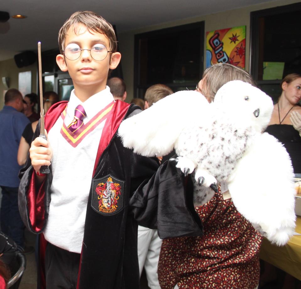 Public tastes have changed and grown, but for decades audiences have flocked to see a blockbuster on the big screen. In 2011 a young Harry Potter fan joins a premiere party at Carmike's Fleming island theater to be among the first to see "Harry Potter and the Deathly Hallows Part 2."