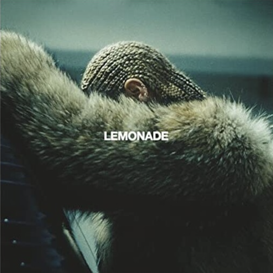 beyonce with braided hair and fur jacket