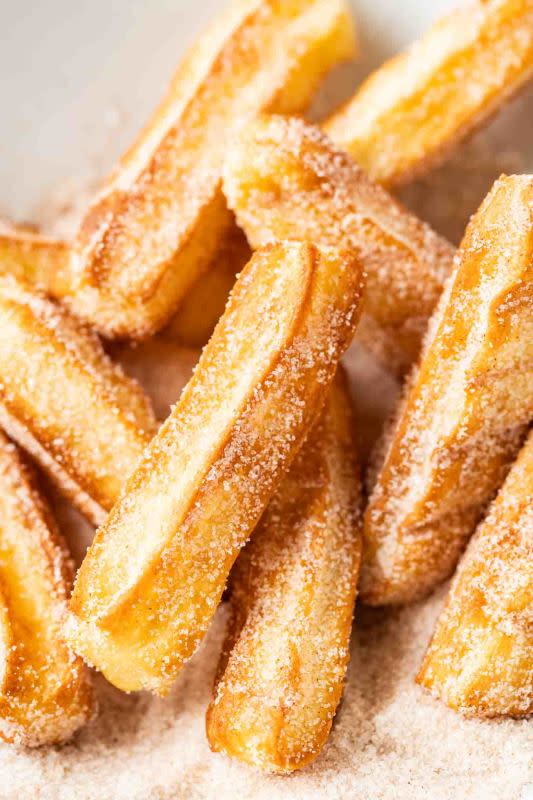 <p>Plated Cravings</p><p>These air fryer churros are fried to golden perfection and make a delicious dessert for your next party!</p><p><strong>Get the recipe: <a href="https://platedcravings.com/air-fryer-churros/" rel="nofollow noopener" target="_blank" data-ylk="slk:Air Fryer Churros;elm:context_link;itc:0;sec:content-canvas" class="link ">Air Fryer Churros</a></strong></p>