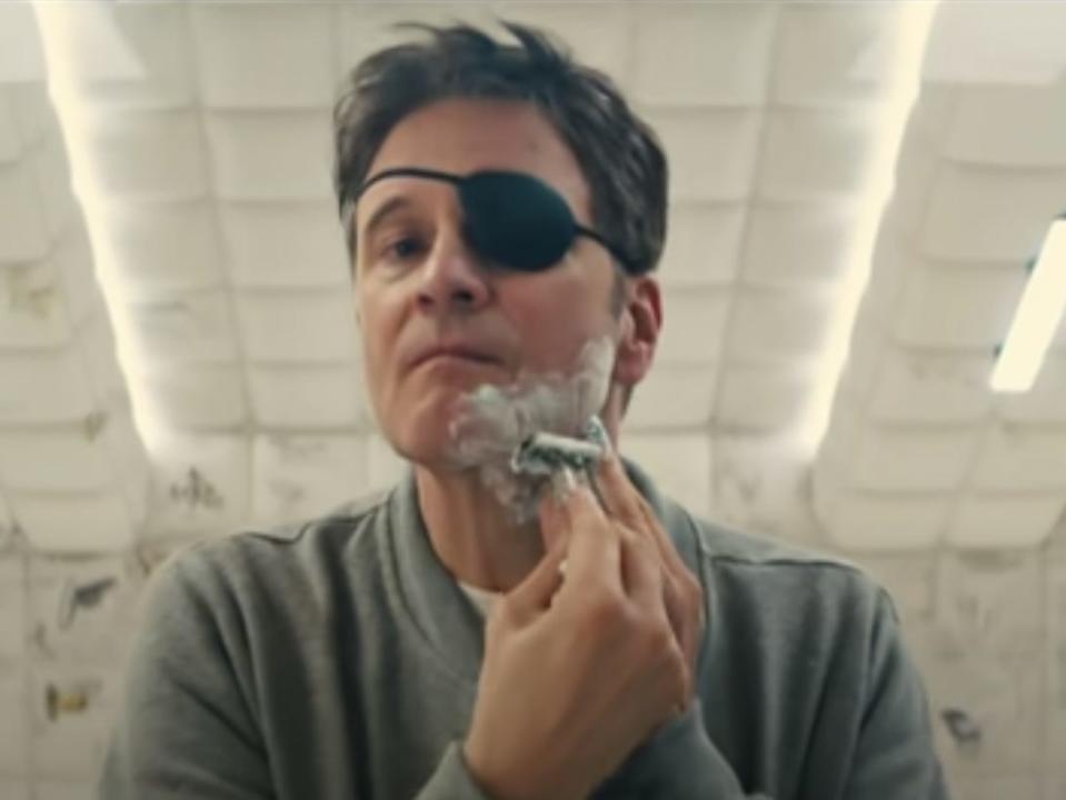 Colin Firth wearing an eye patch and shaving his face in "Kingsman: The Golden Circle."